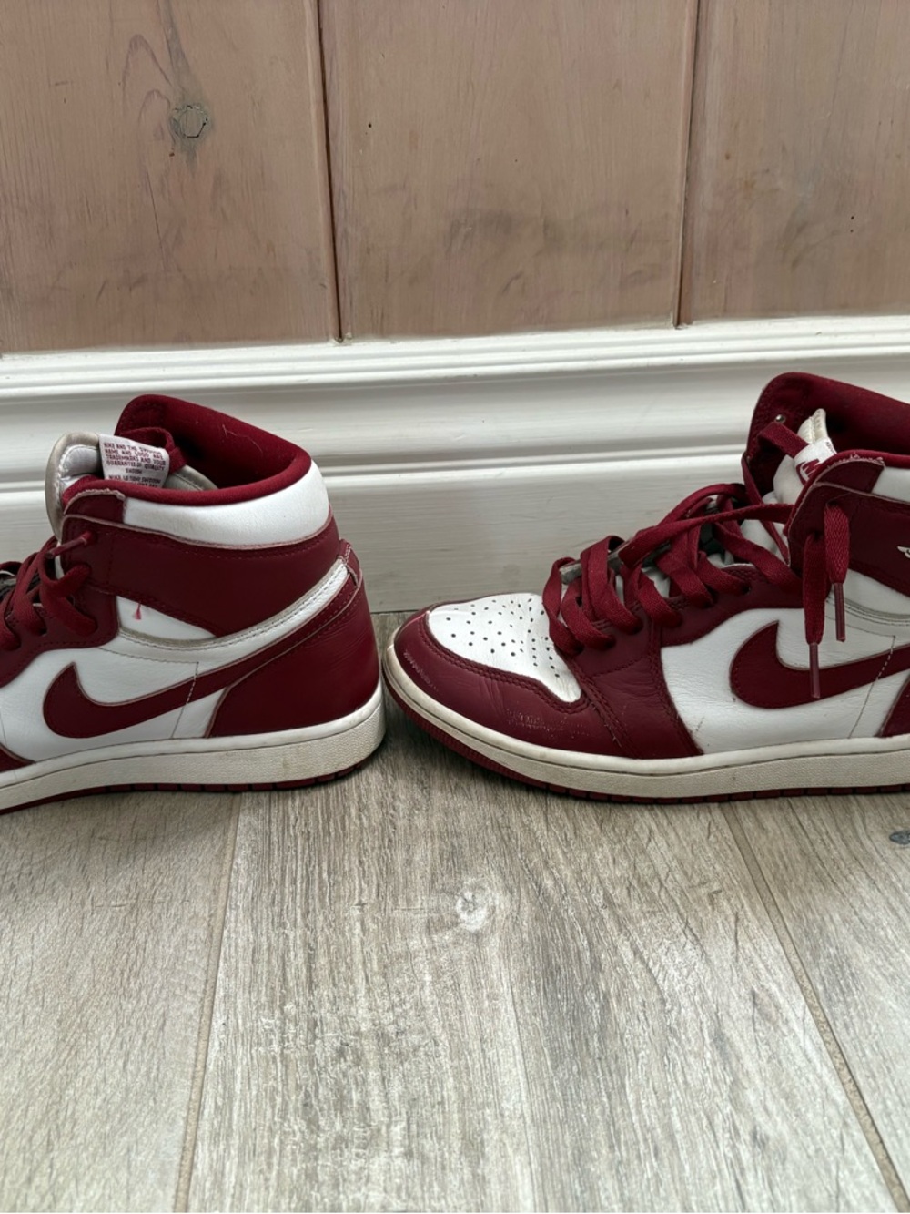 Nike White and Red High-Top Sneakers with Red Swoosh